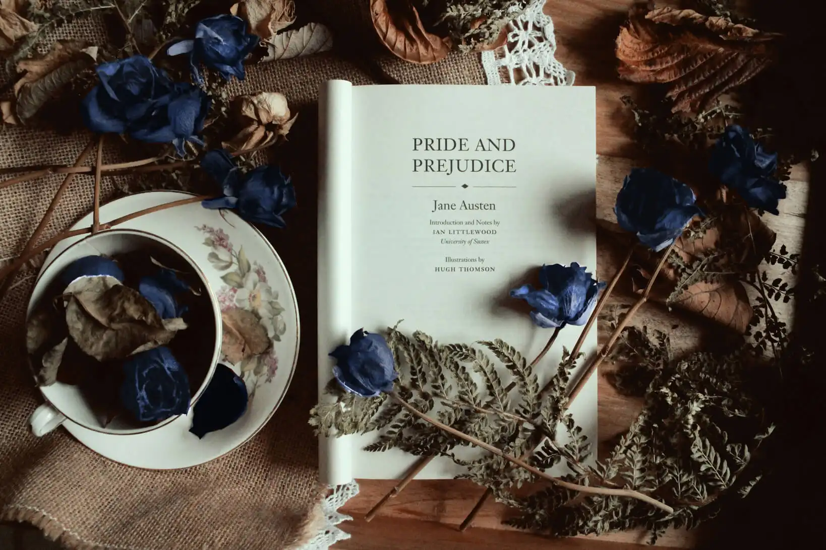 Pride and Prejudice book covered in blue roses representative of Melissa Anne's brand colors